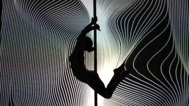 Watch This Pole Dancer’s Gorgeous Interactive Routine With Geometric Light