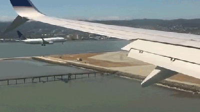 Neat Video Shows Two Passenger Jets Landing Side-By-Side At The Same Time