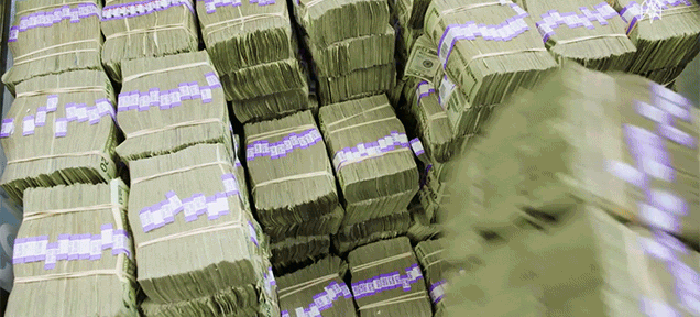 Watch Old US Dollar Bills Get Turned Into Dirt