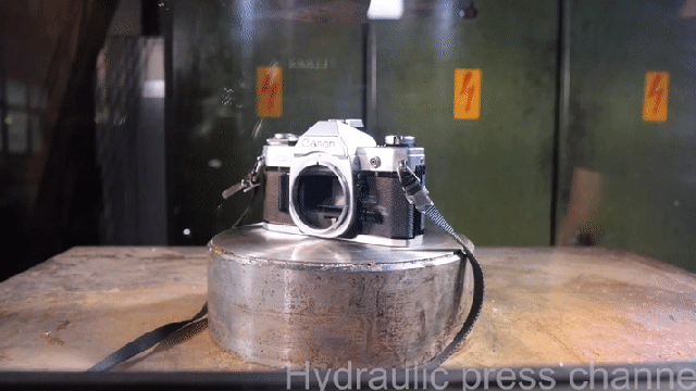 Crushing Old Cameras With A Hydraulic Press Is Tragically Fascinating