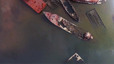 Hauntingly Beautiful Drone Footage Of A Boat Graveyard