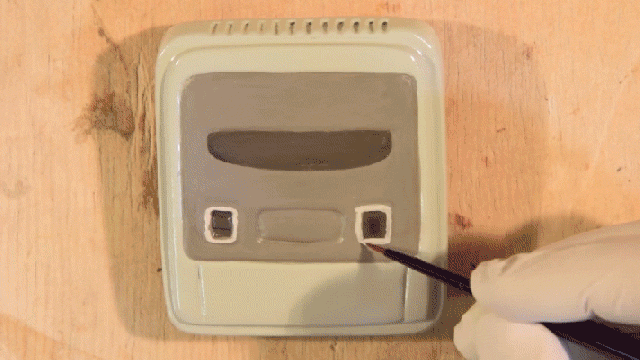 Watch Someone Hand-Carve A Very, Very, Very Small, Working Super Nintendo