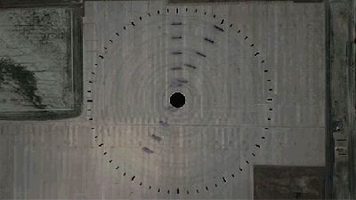 This Gigantic Working Clock Is Actually A Fleet Of Trucks Driving In Circles
