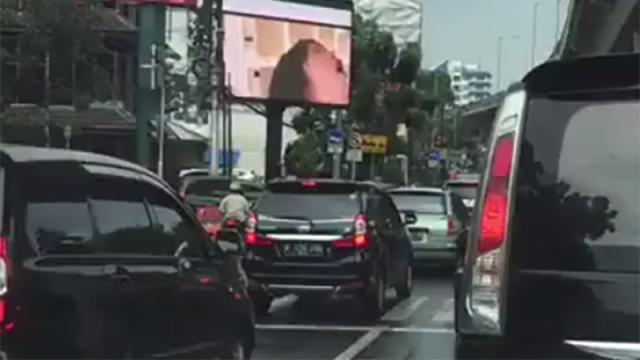 Porn Plays On Electronic Billboard During Traffic Jam [NSFW]