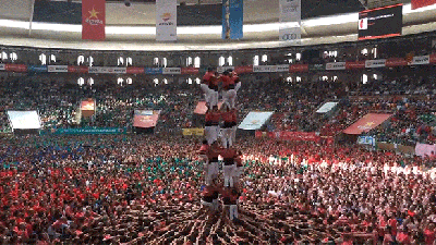 Watch Humans Stack Themselves Into An Impressively Tall Human Tower