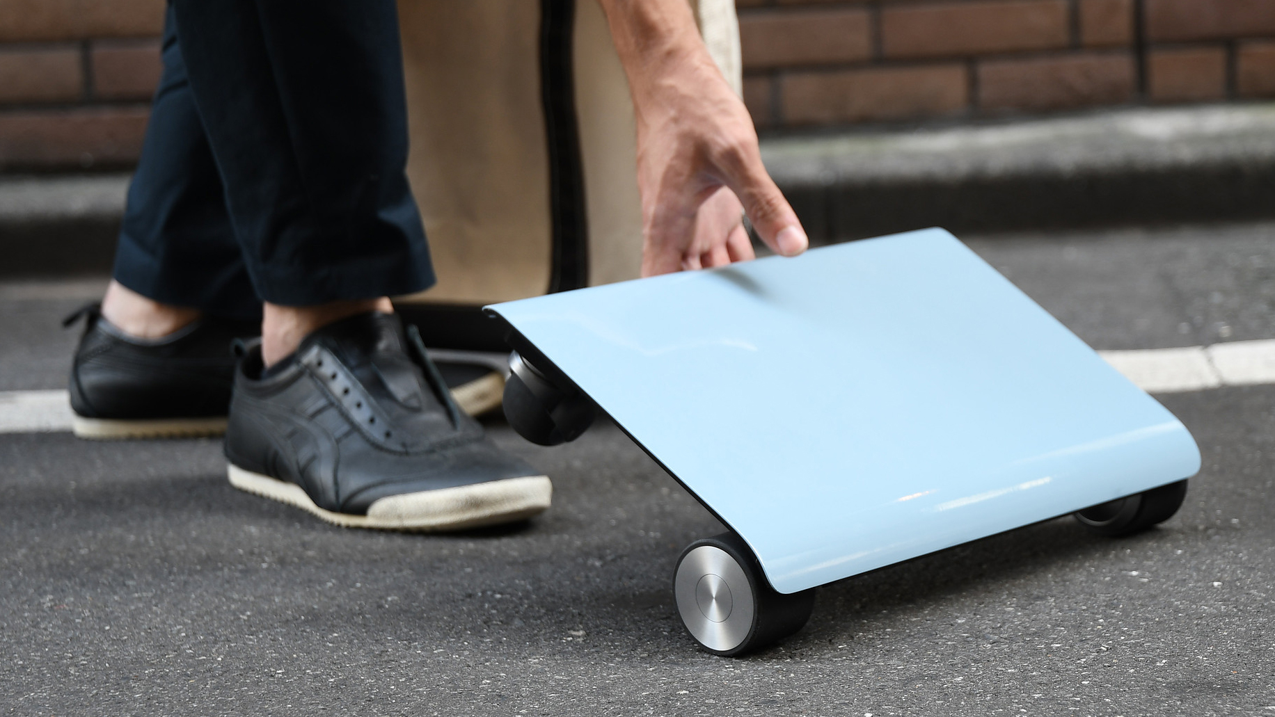 You Can Soon Buy That Tiny Scooter That Looks Like A Laptop You Can Ride