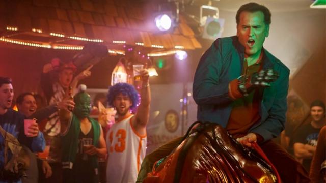 Ash Vs Evil Dead’s Bruce Campbell Riding A Mechanical Bull Is A Groovy Sight Indeed