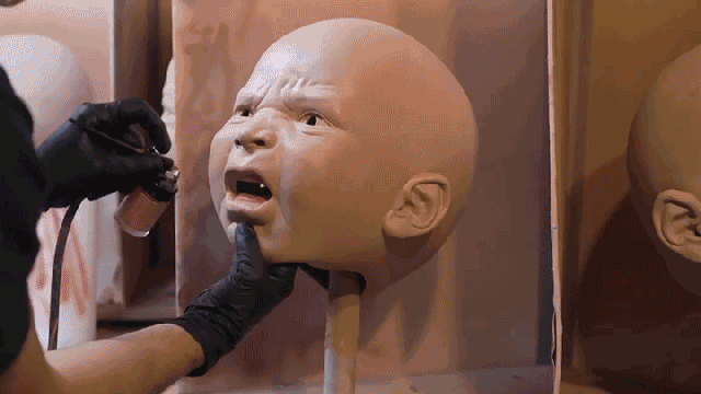 Making Oversized Baby Masks Might Be The Creepiest Thing You See This Halloween
