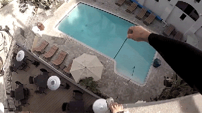 This Dude Really Can’t Stop Making Ridiculous Jumps Off Buildings Into Pools