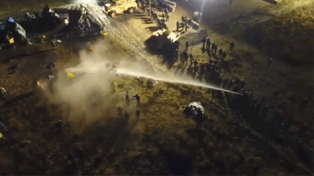 Watch Police Spray Pipeline Protesters With Water Cannons In Freezing Weather