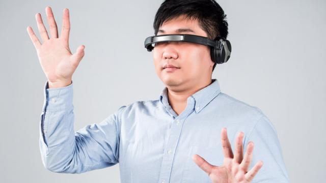 The Future Of Tech Is Sideways Headphones (According To Stock Photos)