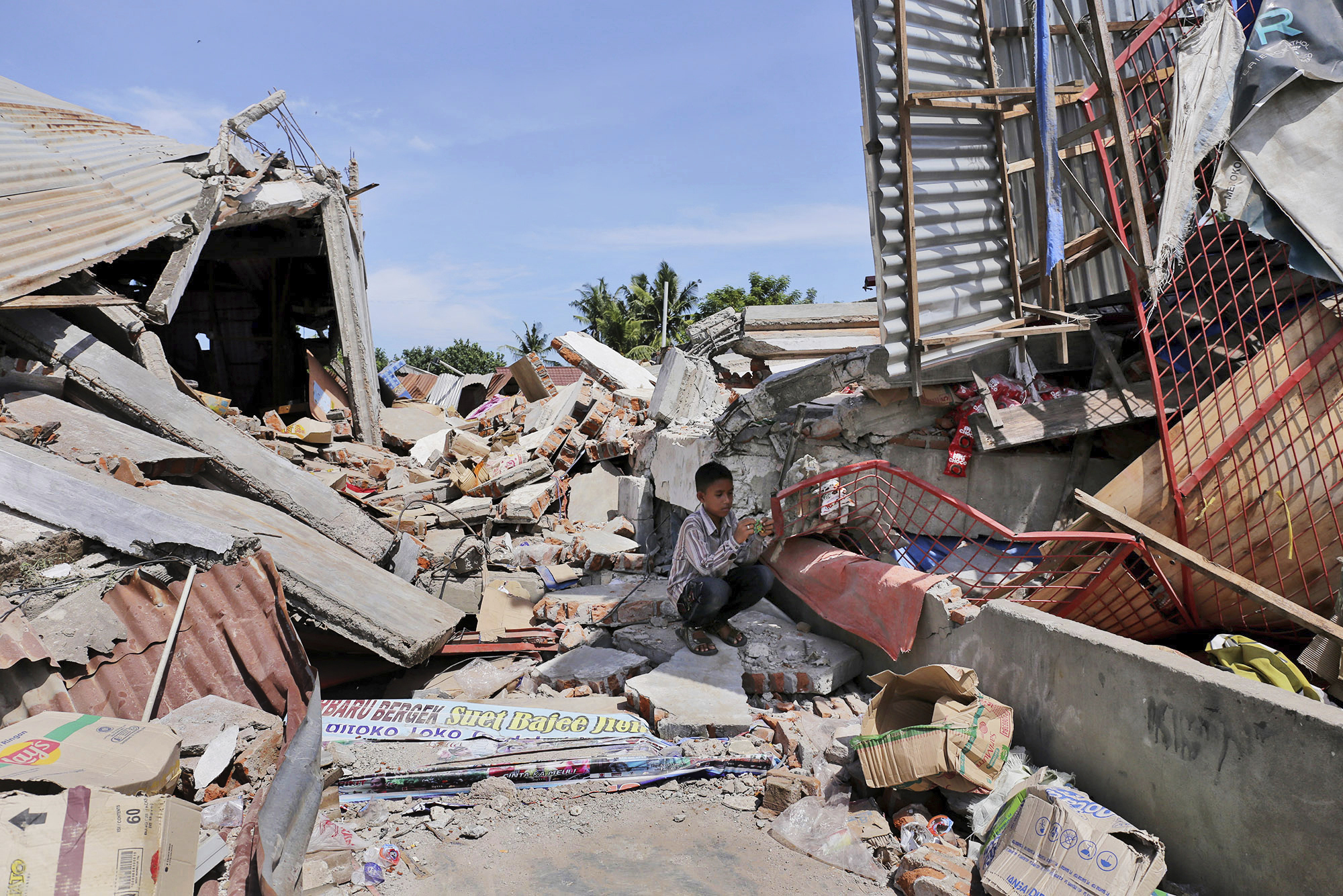 Nearly 100 Dead As Strong Earthquake Rocks Indonesia