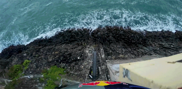 Watch This Cyclist Front Flip Off A Cliff Right Into The Freaking Ocean