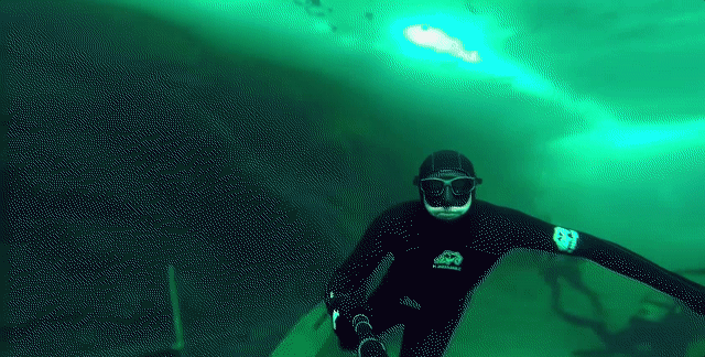 Free-Diving In A Frozen Lake Looks Terrifying And Surreal