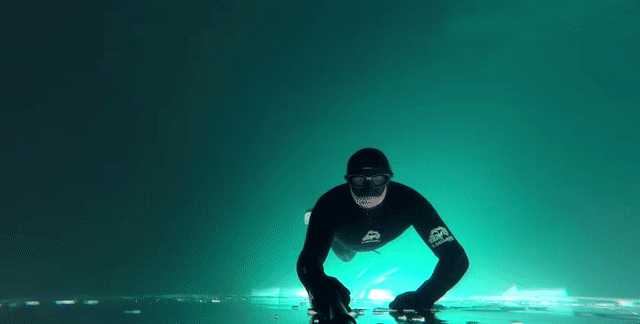 Free-Diving In A Frozen Lake Looks Terrifying And Surreal