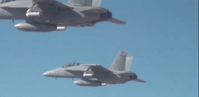 Watch Fighter Jets Poop A Swarm Of Tiny, Screaming Drones  