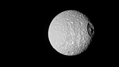Saturn’s ‘Death Star’ Moon Looks Spooky As Hell In New Cassini Photo