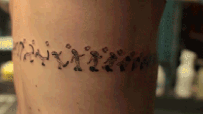 Guy Gets A String Of Tattoos Around His Body That Come To Life When He Spins Around