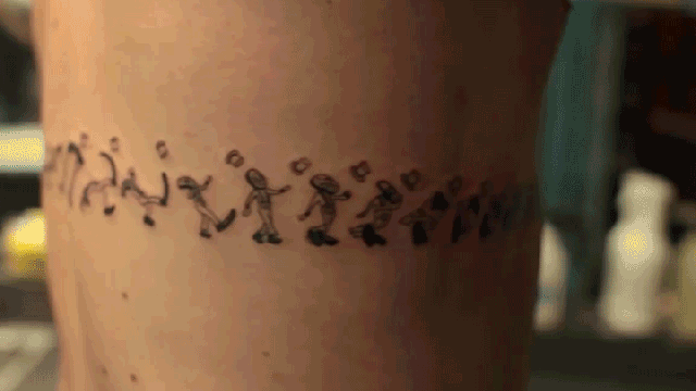 Guy Gets A String Of Tattoos Around His Body That Come To Life When He Spins Around