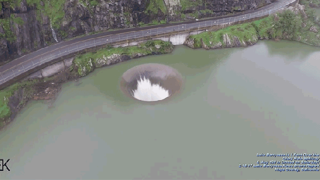 Drone Footage Of A Draining Dam Looks Like Flying Into A Black Hole