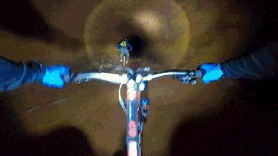 Mountain Biking Down An Abandoned Mine Shaft Is A Dimly Lit Descent Into Hell