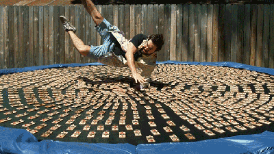 Diving Into 1000 Mouse Traps On A Trampoline Looks Even More Painful In Slo-Mo