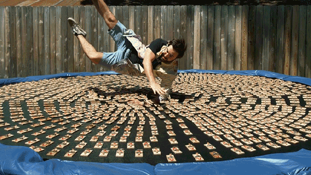 Diving Into 1000 Mouse Traps On A Trampoline Looks Even More Painful In Slo-Mo