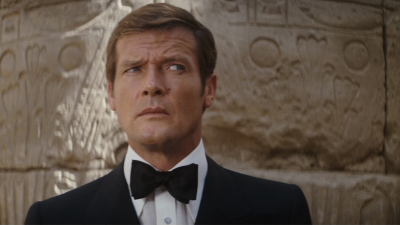 Sir Roger Moore, Who Portrayed James Bond As A Playful Superspy, Dead At 89