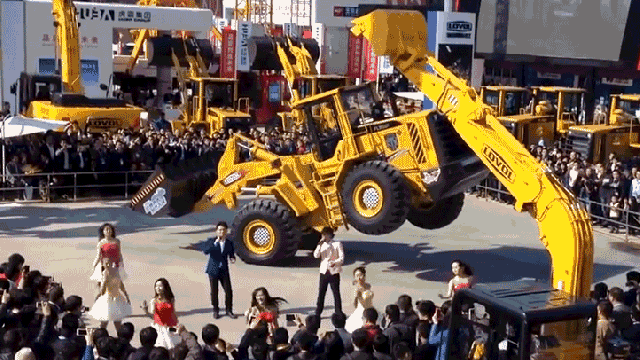 Watch 18-Tonne Earth Mover Dance On Two Wheels