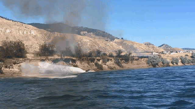 Watch This Heroic Captain Use His Boat’s Powerful Jet Stream To Put Out A Massive Fire