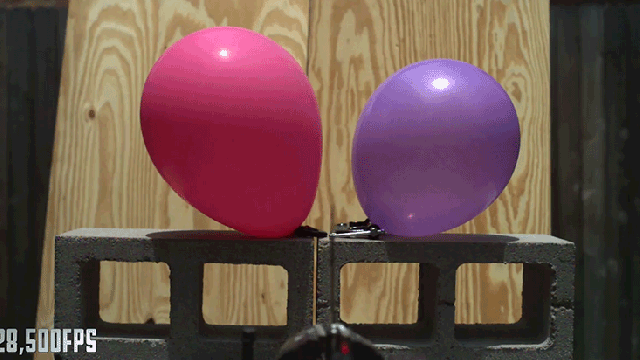 Slo-Mo Footage Of A Giant Knife Splitting A Projectile In Mid-Air