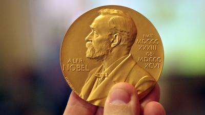 Nobel-Winning Physicist Worried About 100 Chocolate Coin Wager Over New Particles