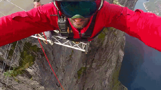 Watch This Daredevil Dive 1,300-Feet Off A Cliff Using Nothing But A Rope To Stop His Fall