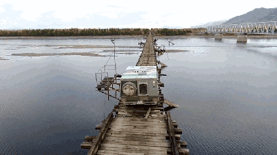 Try To Watch An SUV Cross This Terrifying Siberian Bridge Without Having A Panic Attack