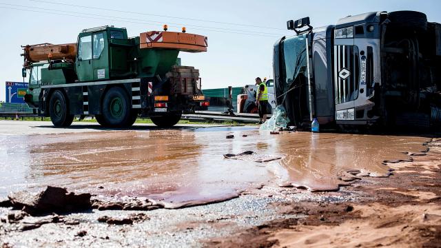 Oops! A Tippy Truck Spilled A Ton Of Sticky Chocolate All Over The Road