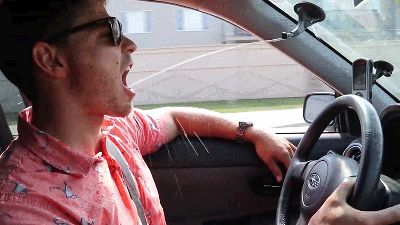 Thirsty Genius Upgrades His Car’s Windshield Wipers To Squirt Juice Into His Mouth