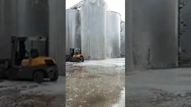 Bottoms Up! 30,000 Litres Of Bubbly Bursts From Foamy Wine Tank