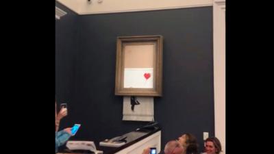 Banksy’s Predictable Criticisms Of Capitalism Continue With Self-Shredding Painting