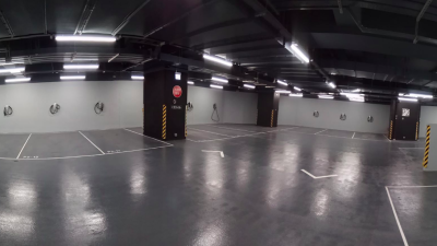 Tesla Shows What The Parking Garage Of The Future Could Look Like