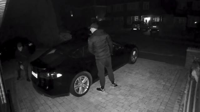 Hackers Allegedly Caught On Video Stealing Tesla Model S, Struggling To Unplug Charger