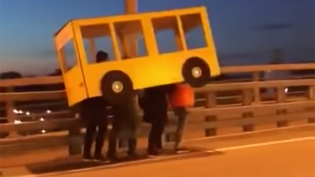 Russian Heroes Dress Up As A Bus To Cross Bridge
