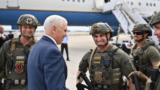 Mike Pence Tweets And Later Deletes Photo With Florida Sheriff’s Deputy Sporting A QAnon Patch