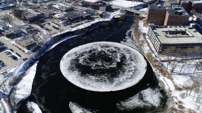 Massive Ice Disk In Maine Stops Spinning, Is Somehow Rescued By Paddleboarder