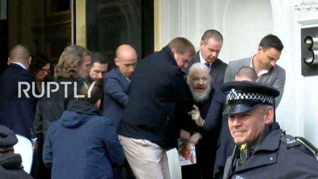 Julian Assange Dragged Out Of Ecuadorian Embassy And Arrested By British Police