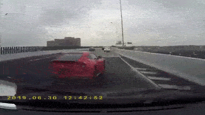 Watch A Dummy Lose Control Of A Ferrari F12 And Crash It Into Barriers On Both Sides Of The Road