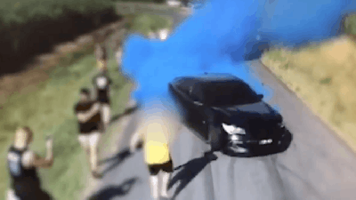 Drone Captures Aussie Car Bursting Into Flames During Gender Reveal Video Shoot