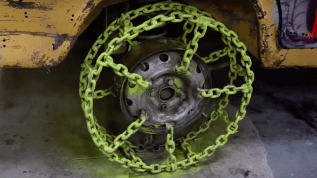 Watch This Man Drive His Car On Wheels Made Of Chains