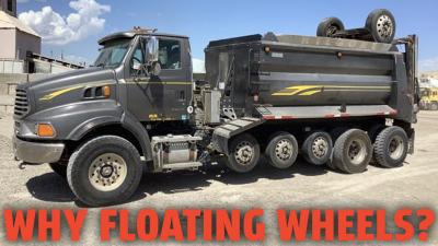 Why Some Trucks Have Those Extra Wheels That Don’t Always Touch The Ground