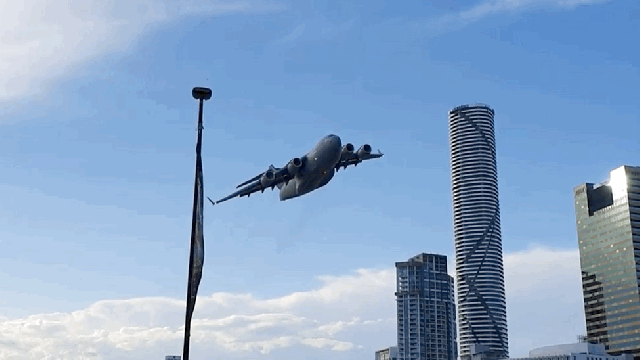 Watch An Australian Air Force Cargo Jet Fly Casually Among Brisbane’s Skyscrapers