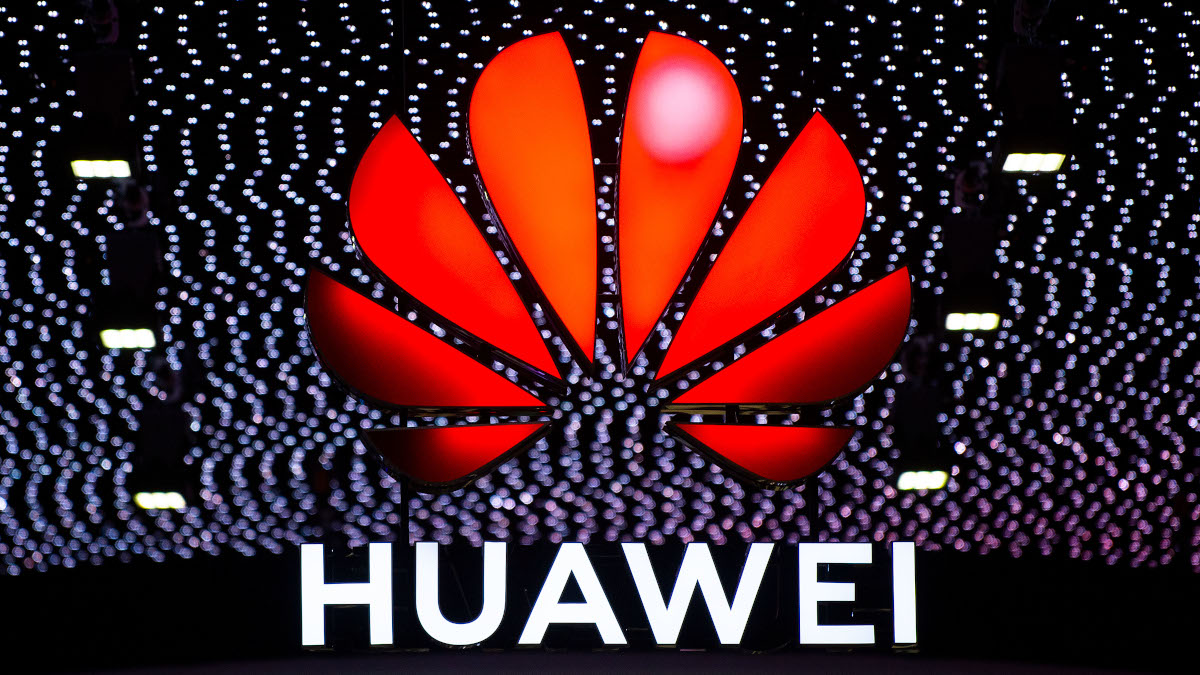 A logo sits illumintated outside the Huawei booth on day 2 of the GSMA Mobile World Congress 2019 on February 26, 2019 in Barcelona